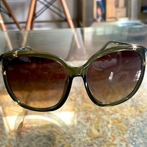 MK sunglasses with jade green frame and gold detailing